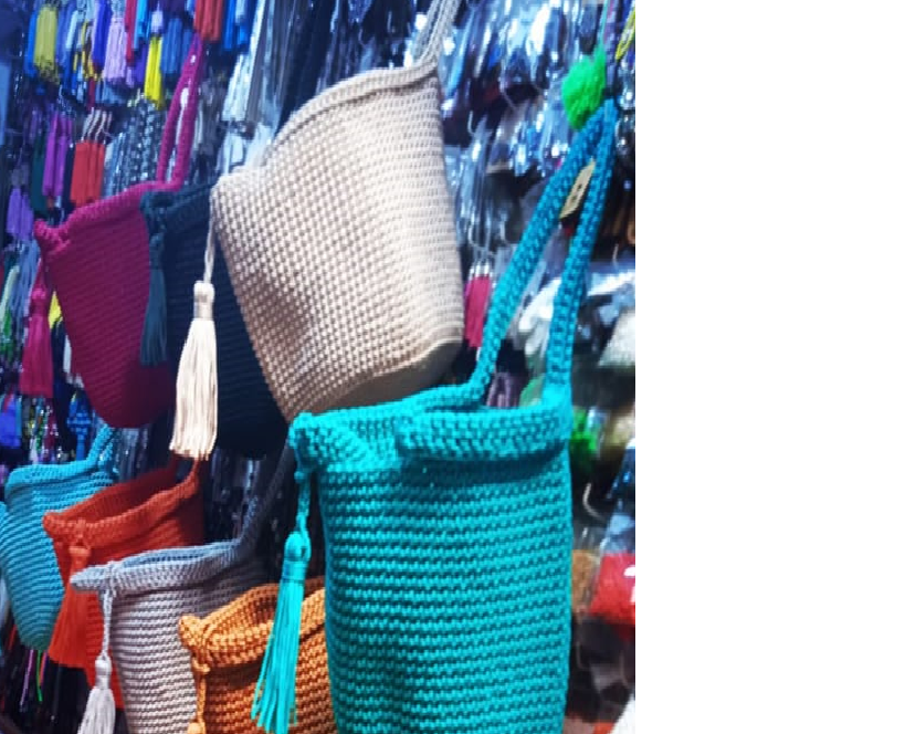 Handcrafted crochet bucket bags in a rich spectrum